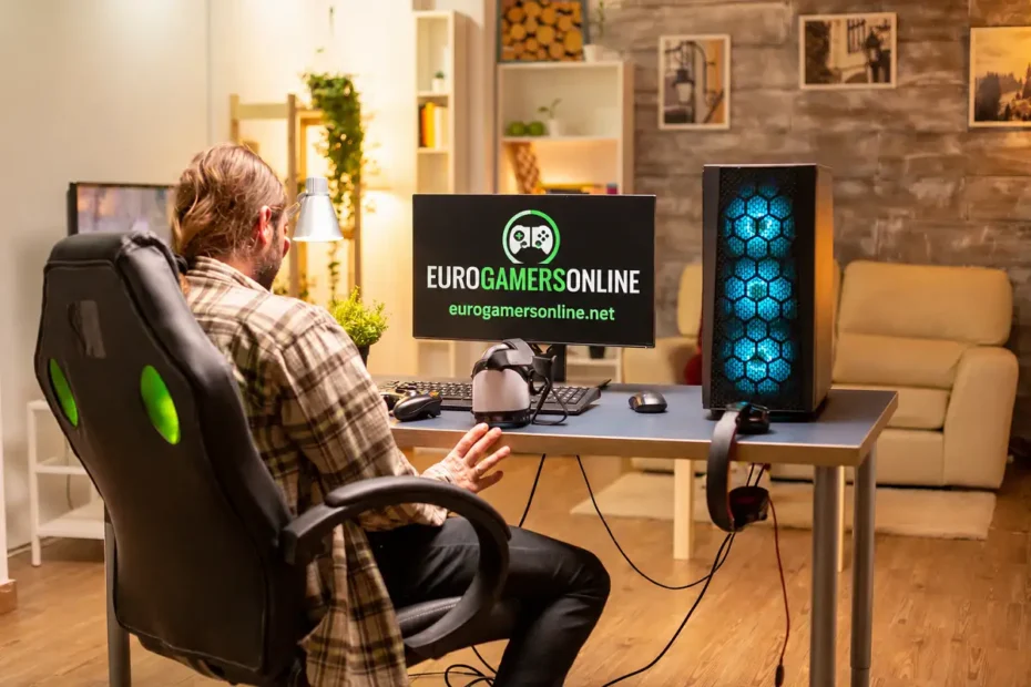 Man sitting at a gaming PC setup with EuroGamersOnline Console branding displayed on the monitor.